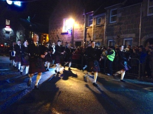 Pipers performing before the fireball swinging began